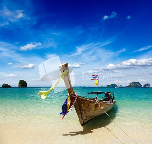 Image of Long tail boat on beach, Thailand