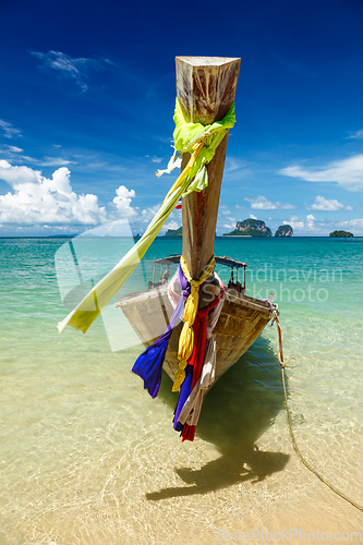 Image of Long tail boat on beach, Thailand