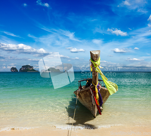 Image of Long tail boat on beach, Thailand