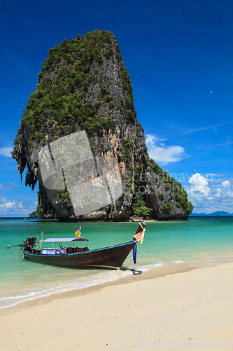 Image of Long tail boat on beach, Thailand