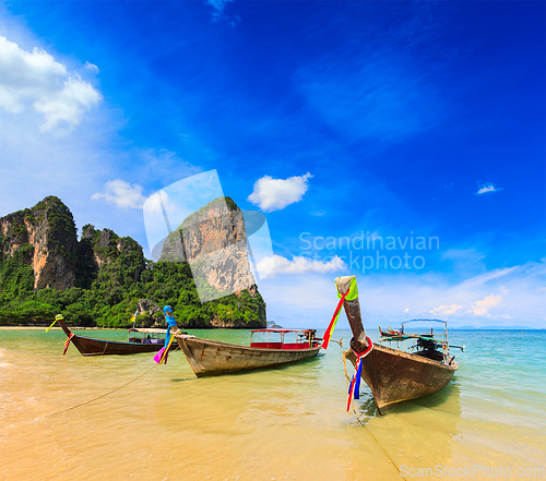 Image of Long tail boats on beach, Thailand