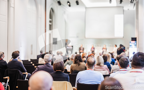 Image of Round table discussion at business conference meeting event.. Audience at the conference hall. Business and entrepreneurship symposium.