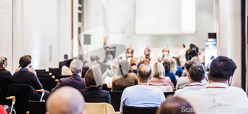 Image of Round table discussion at business conference meeting event.. Audience at the conference hall. Business and entrepreneurship symposium.