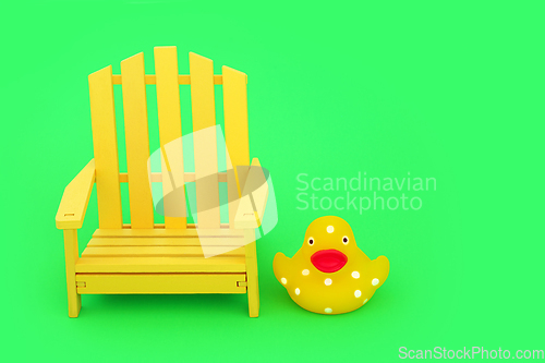 Image of Crazy Surreal Composition with Yellow Chair and Spotted Duckling