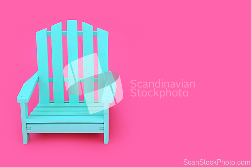 Image of Alone Time with Wooden Blue Chair on Vivid Pink