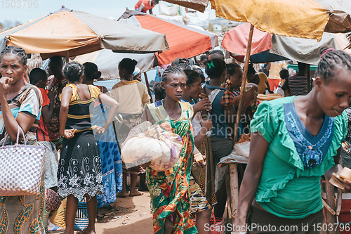 Image of Malagasy peoples on big colorful rural Madagascar marketplace