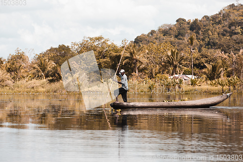 Image of Native Malagasy fishermen fishing on river, Madagascar