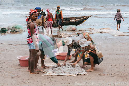 Image of Native Malagasy fishermen fishing on sea, Madagascar