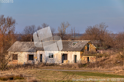 Image of rundown and abandoned house in countryside