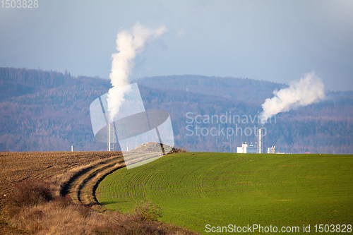 Image of Smoke emission from factory pipes