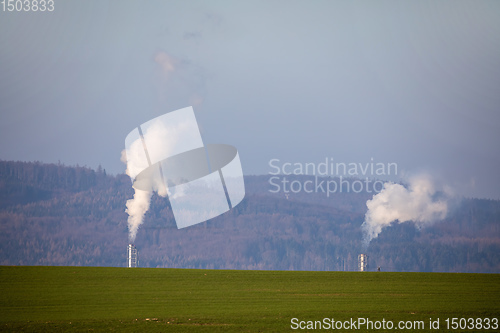 Image of Smoke emission from factory pipes