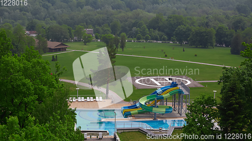 Image of swimming pool on luxury resort in forest.