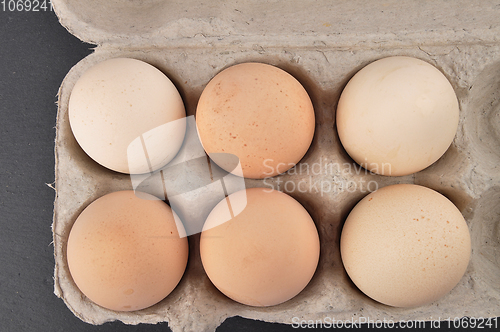 Image of Organic eggs in cardboard