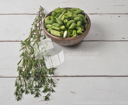 Image of Beans and savory on wood