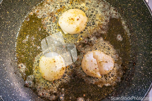 Image of Fried scallops with butter and garlic sauce