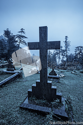 Image of Spooky Halloween graveyard in fog