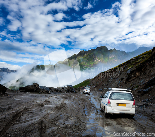 Image of Vehicles on bad road in Himalayas