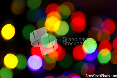 Image of Colorful festive blurry lights of Christmas decorations