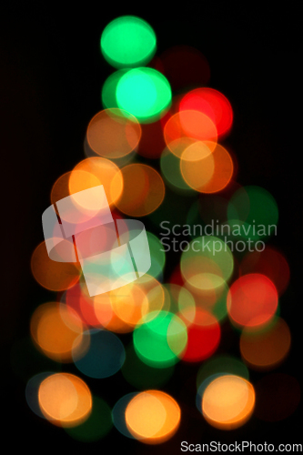 Image of Christmas Tree, Unfocused Colorful Lights Background