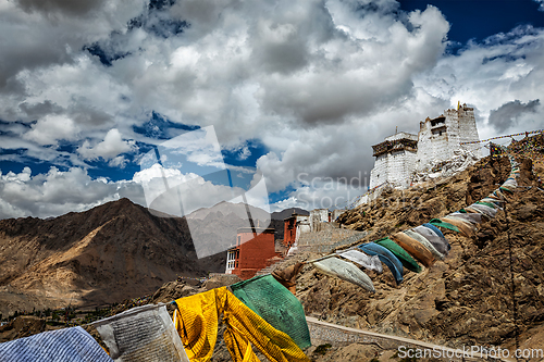 Image of Leh gompa and lungta prayer flags, Ladakh