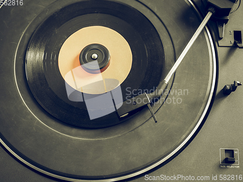 Image of Vintage looking Vinyl record on turntable