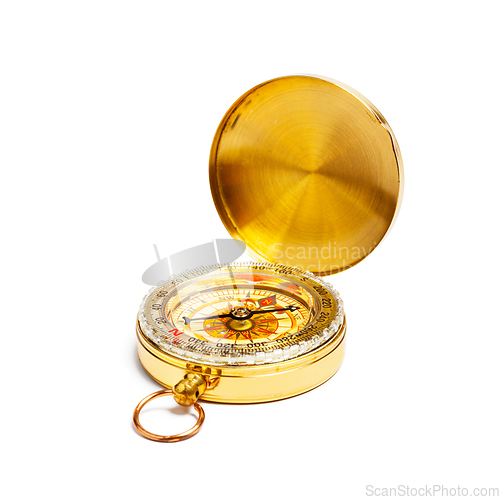Image of Vintage golden compass isolated