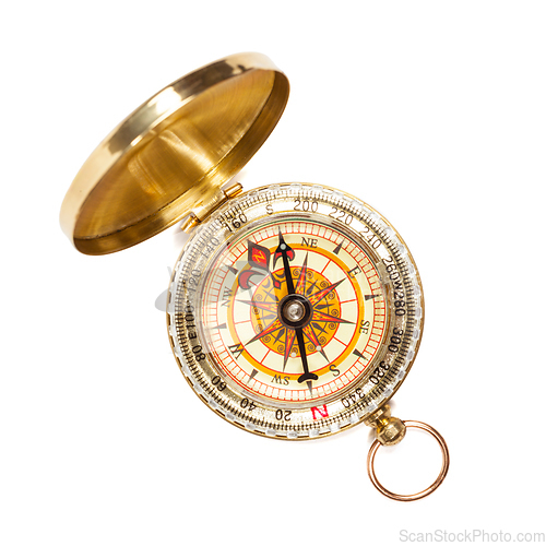 Image of Vintage golden compass isolated