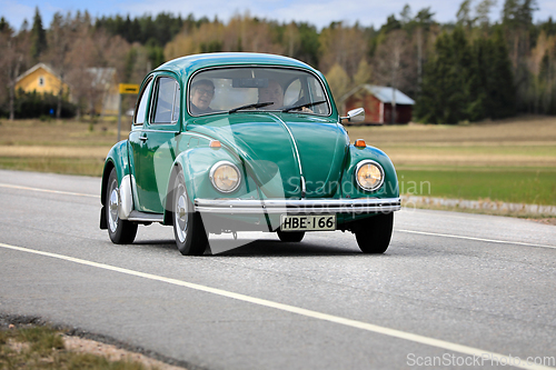 Image of Green 1973 Volkswagen Beetle 1300 Car on Road