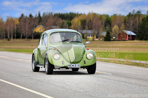 Image of 1974 Green Volkswagen Beetle 1300 Car on Road