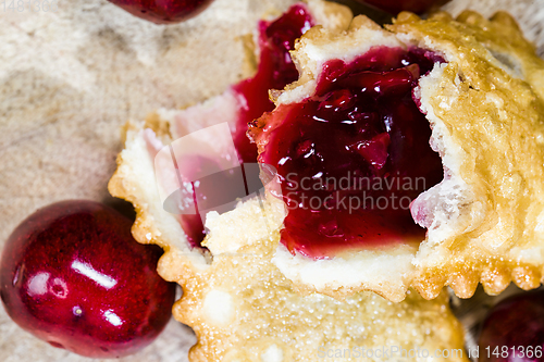 Image of cherry jam in a crispy bun