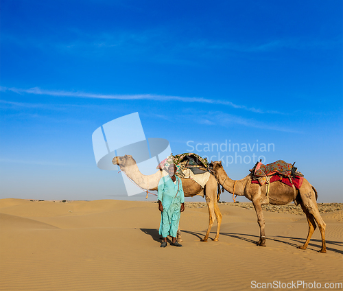 Image of Cameleer (camel driver) camels in Rajasthan, India