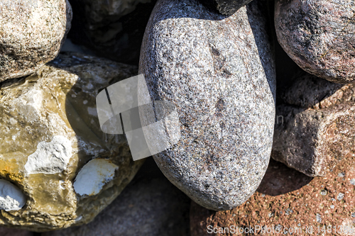 Image of heavy large and small stones