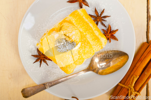 Image of cream roll cake dessert and spices