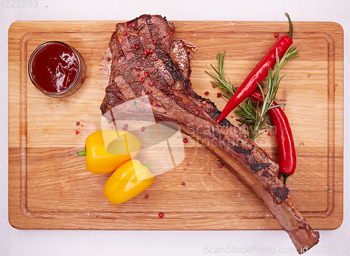 Image of The Barbecue Tomahawk Steak on Cutting Board