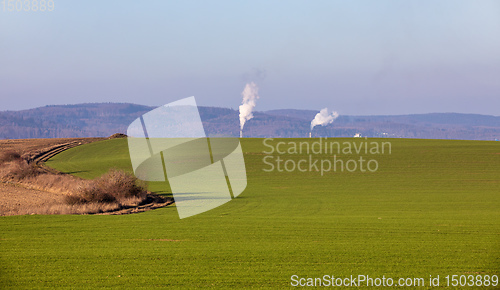 Image of Smoke emission from factory pipes