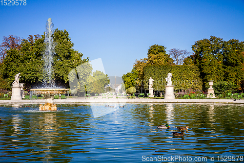 Image of Tuileries Garden pond, Obelisk and triumphal arch, Paris, France
