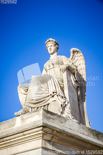 Image of History statue near the Triumphal Arch of the Carrousel, Paris, 
