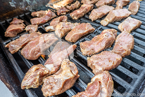 Image of yummy steak on the grill for dinner