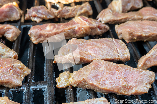 Image of yummy steak on the grill for dinner