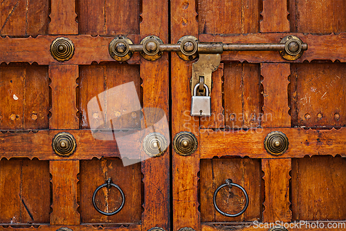 Image of Latch with padlock on door