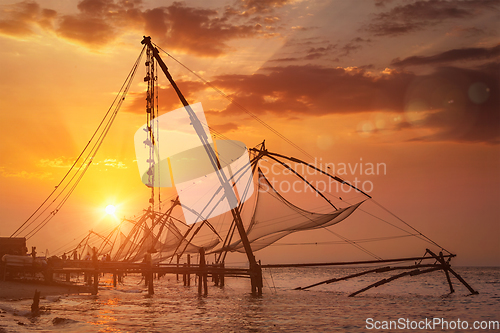 Image of Chinese fishnets on sunset. Kochi, Kerala, India