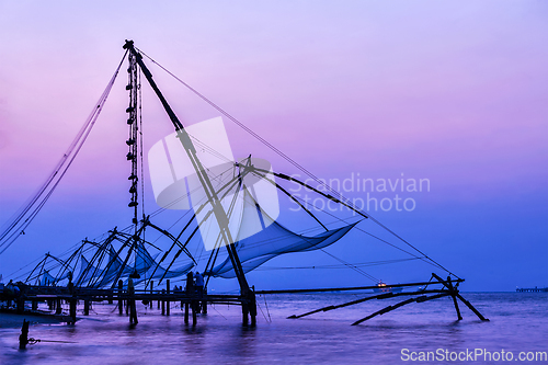 Image of Chinese fishnets on sunset. Kochi, Kerala, India