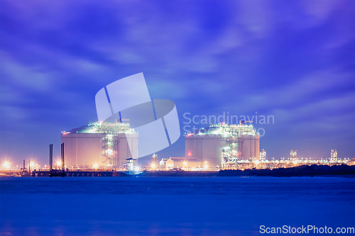 Image of Liquified natural gas LNG tanks in port