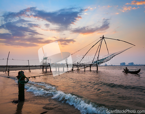 Image of Chinese fishnets on sunset. Kochi, Kerala, India