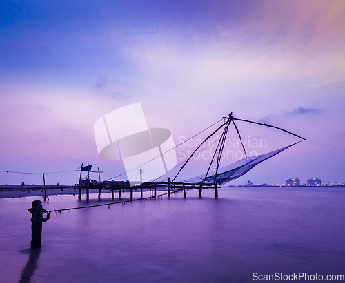 Image of Chinese fishnets on sunset. Kochi, Kerala, India