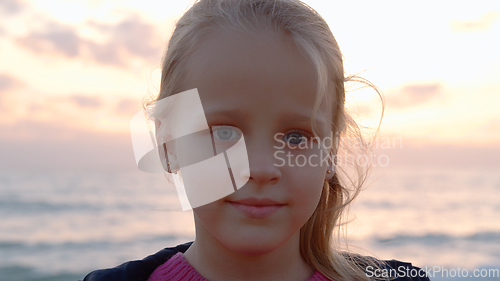 Image of A portrait of a little girl with blue eyes