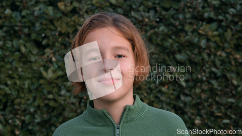 Image of Portrait of a teenager with long hair