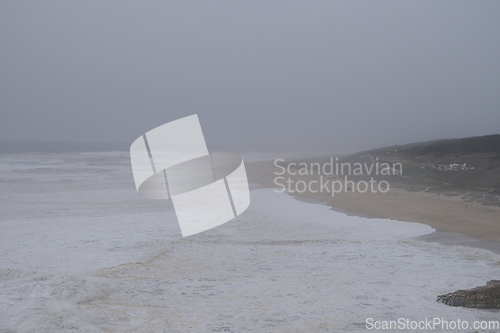 Image of Stormy gray day on the ocean beach