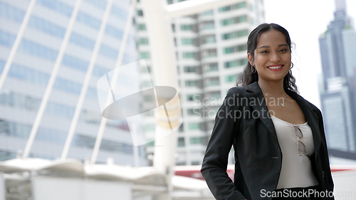 Image of Cheerful Young Businesswoman Enjoying City Life