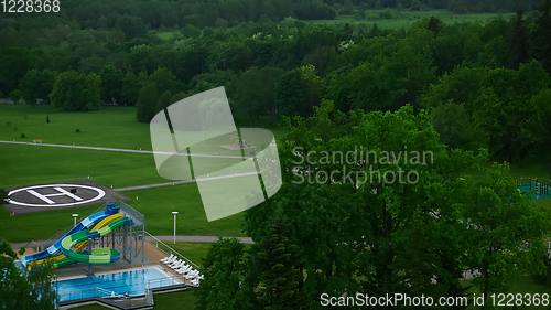 Image of swimming pool on luxury resort in forest.